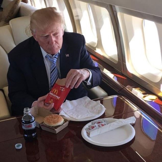 23540172-7900659-President_Trump_is_known_for_his_love_of_fast_food_here_he_eats_-a-70_1579297807220