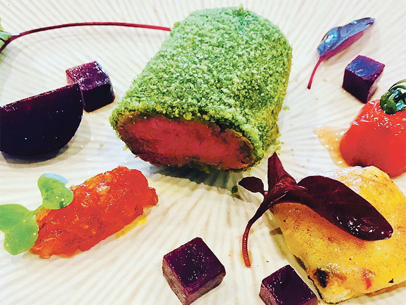 TENDER LAMB: Covered in a lovely green herb crust.