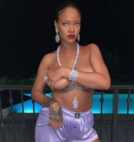 Rihanna Accused of Cultural Appropriation in Topless Photo Rihanna Accused of Cultural Appropriation in Topless Photo