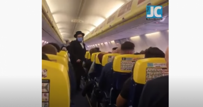 youtube West Ham fans sing abuse at Jewish man on flight to match in Belgium