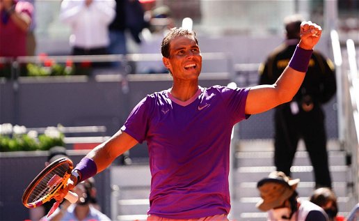 Tennis star, Rafa Nadal, celebrating victory.