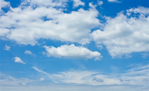Image of a cloudy blue sky.