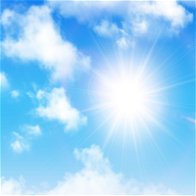 Image of a cloudy but sunny blue sky.