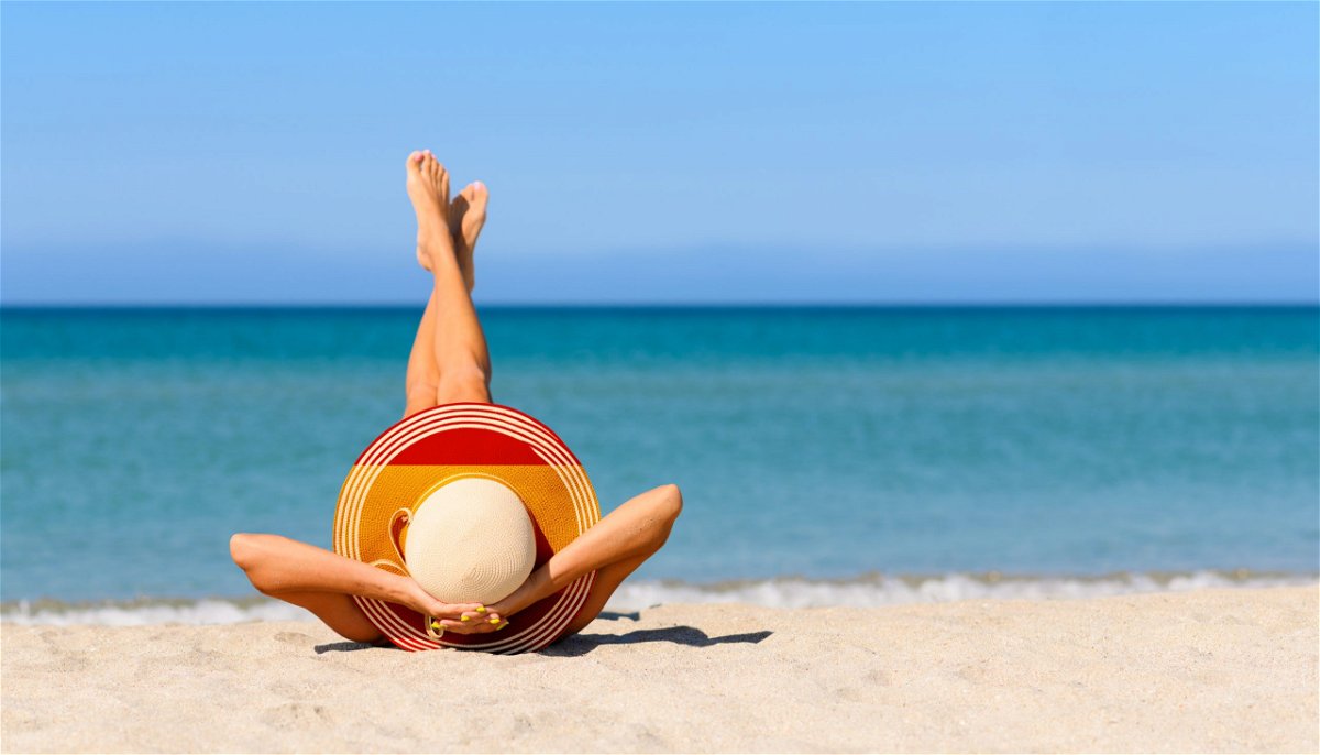 Image - sunbather on beach: Nikita Burdenkov/shutterstock 
