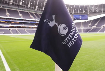 Picture of a corner flag with Tottenham Hotspur's badge.