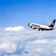 Ryanair plane above skies