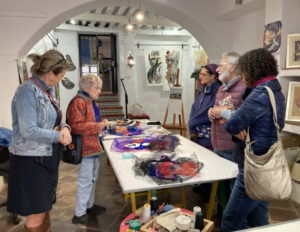 guests looking at an art stall