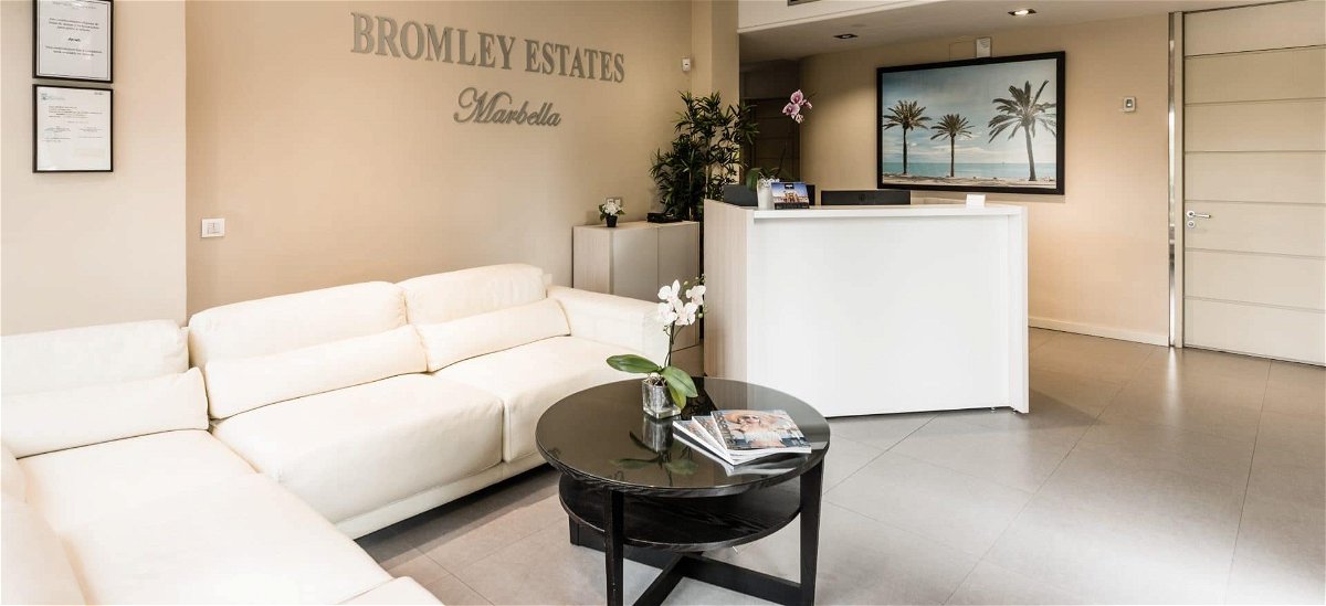 White sofas and a reception desks at the Bromley Estates headquarters