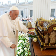 the pope with a flower display