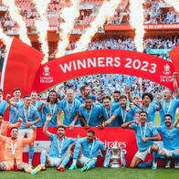 Image of Manchester City with the FA Cup.