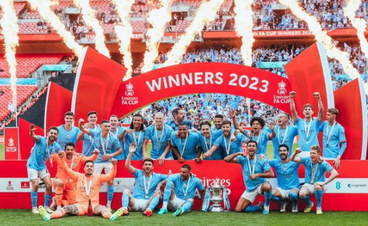 Image of Manchester City with the FA Cup.