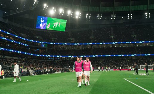 Spurs players warming up at the Tottenham Hotspur Stadium.