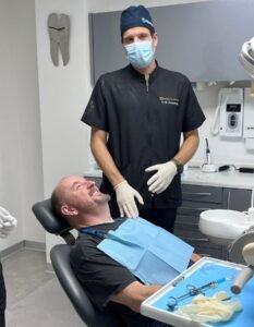 Dentist carrying out procedure 