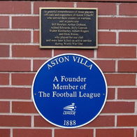Image of a blue plaque at Aston Villa's Villa Park Stadium.