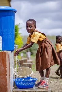 Picture of a girl collecting water