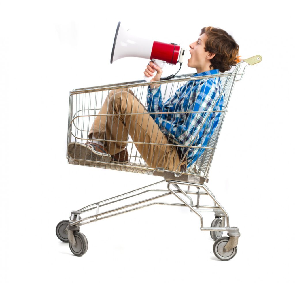 Man in a shopping trolley
