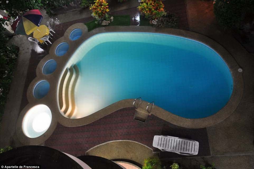 A swimming pool in the shape of a foot