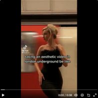 women trying to film on London Underground