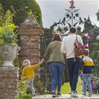 A family visiting a National Trust property