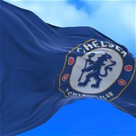 A Chelsea flag blowing in the wind.