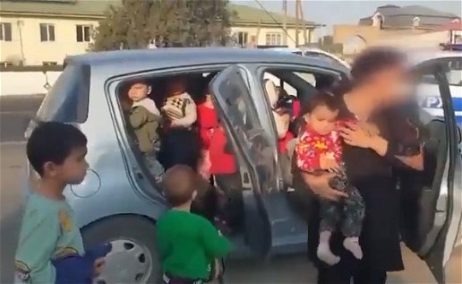 Image of a car in Uzbekistan that had 26 children as passengers.