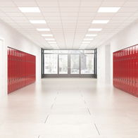 View of a school entrance with red lockers