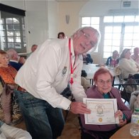 Margaret Forshaw receiving her Gold Certificate.