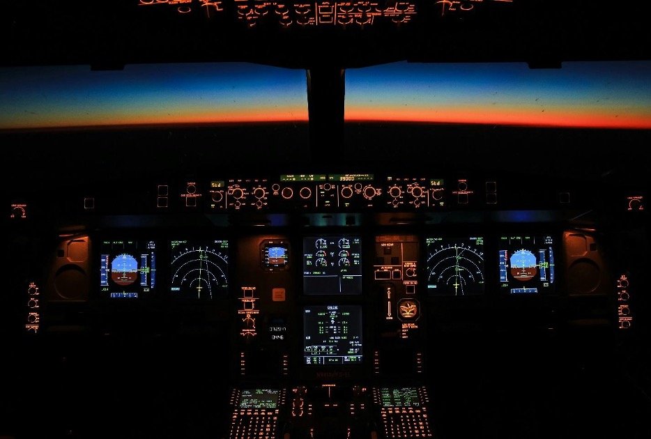 night view of the inside of a airplane cockpit