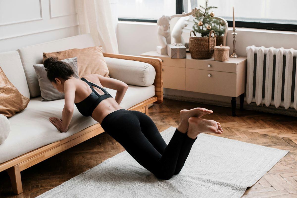 Get Fit Without Leaving Your Couch with These Sofa Workouts