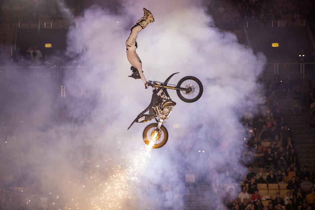 Image of motorcyclist leaping through the air.