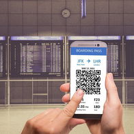Photo of a downloaded boarding pass on a phone