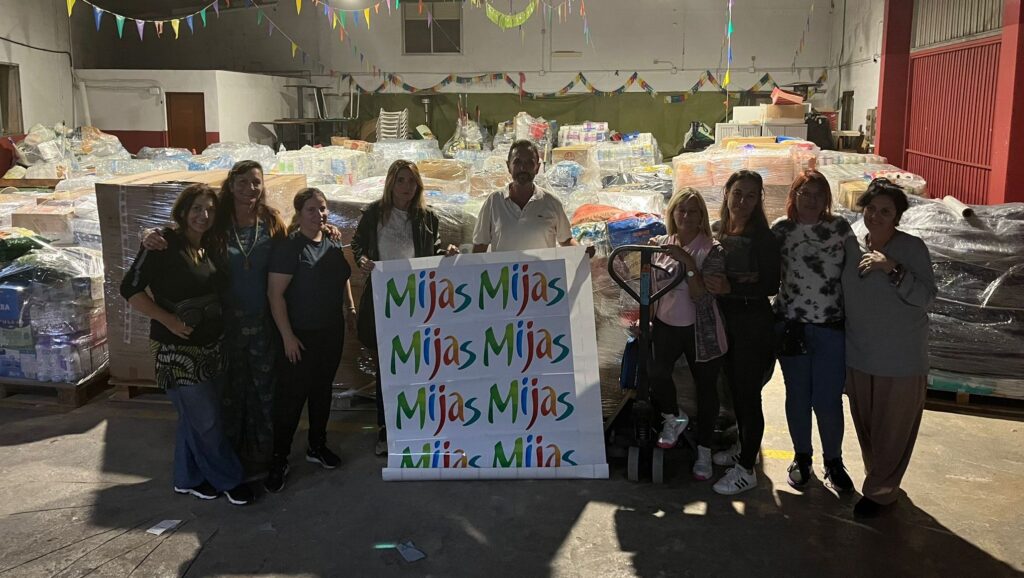 Mayor Ana Mata of Mijas with volunteers collecting tonnes of aid for victim