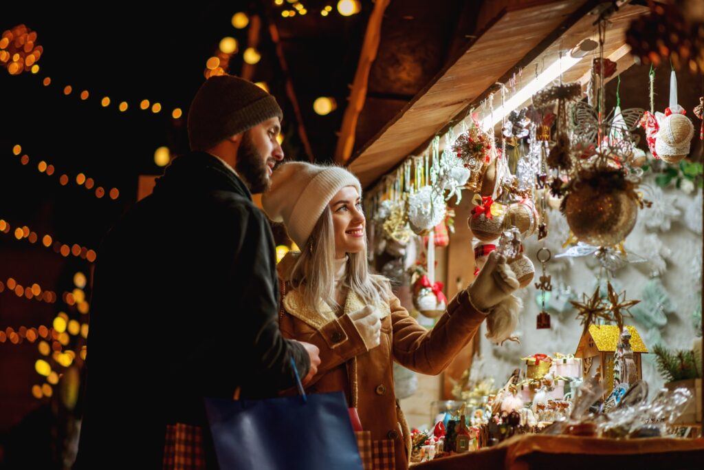 People shopping at a Christmas market Euro Weekly News