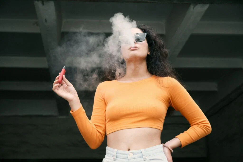 Exploring emerging trends in smoking and vaping across Europe Euro Weekly News young woman vaping