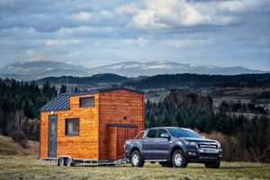 Tiny home being pulled by an SUV