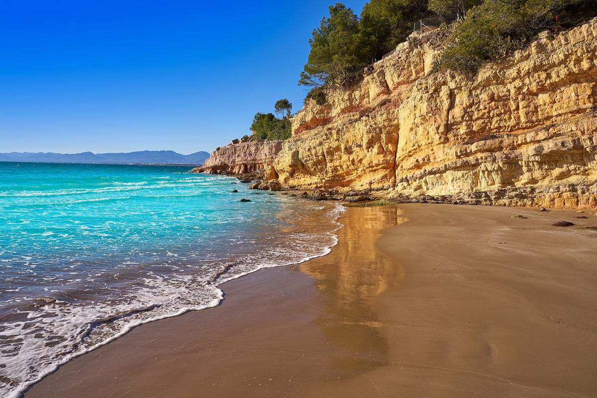 Spain beaches with golden, black, white and red sands