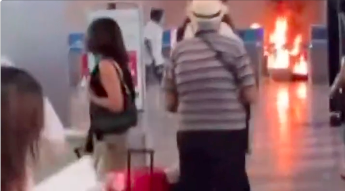 Panic as passenger sets airport ablaze\” />