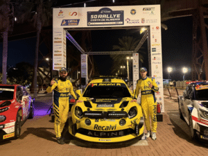 Jorge and Javi alongside their winning car. 