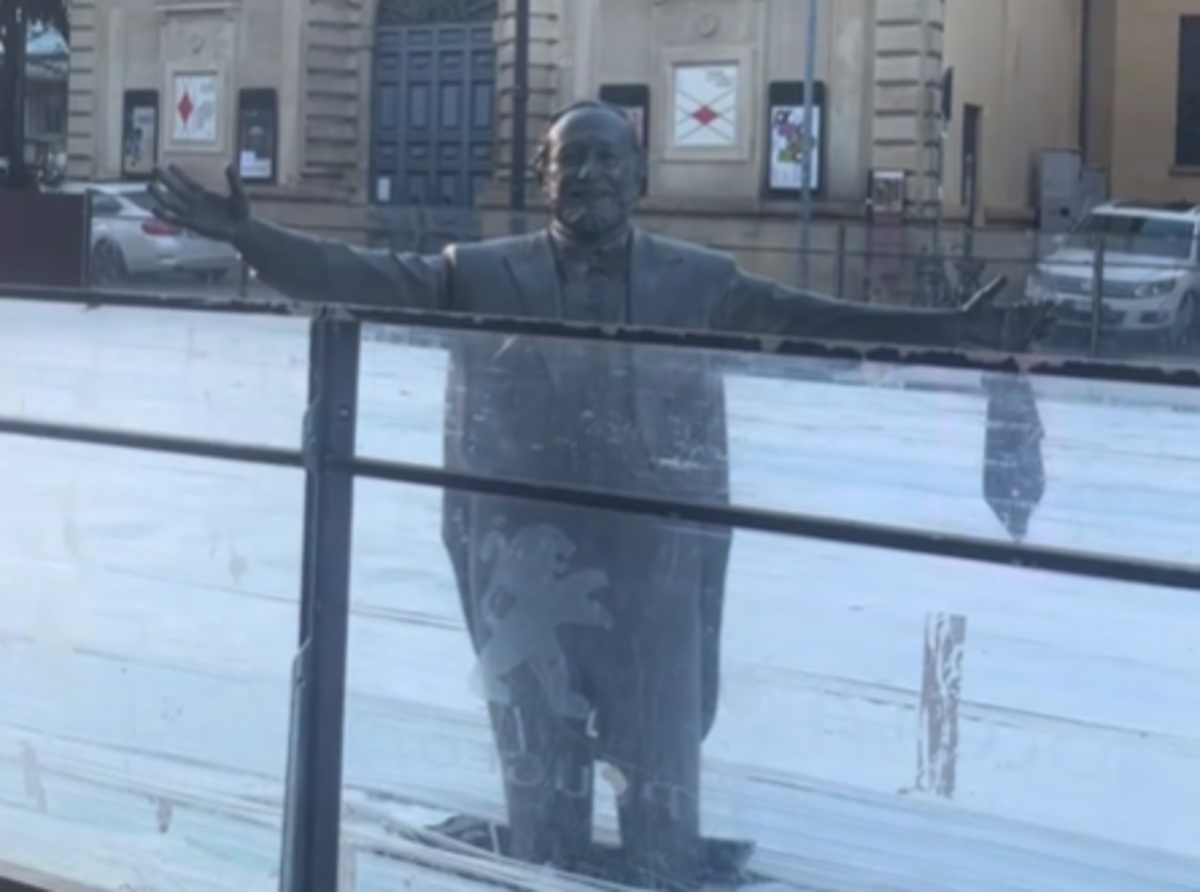 Pavarotti Statue Left Knee-deep Inside Italian Christmas Ice Rink