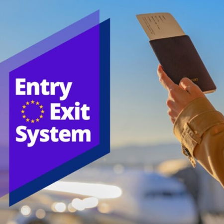 EU Entry/Exit System logo with traveller holding a passport at a border crossing