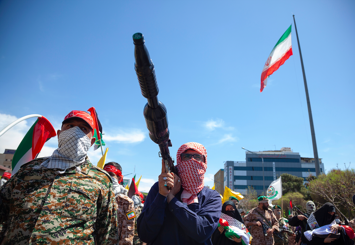 Chaos erupts in Iran as Spain and UK order evacuations