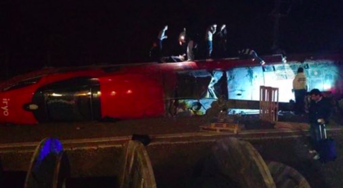 Death toll rises to 21 as passengers face overnight wait on train that derailed in Spain