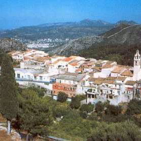 Pedestrians walking through a lively street in Bilbao city centre, northern Spain.