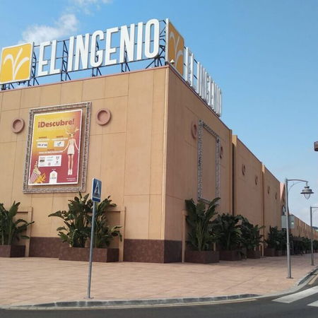 Pedestrians walking through a lively street in Bilbao city centre, northern Spain.