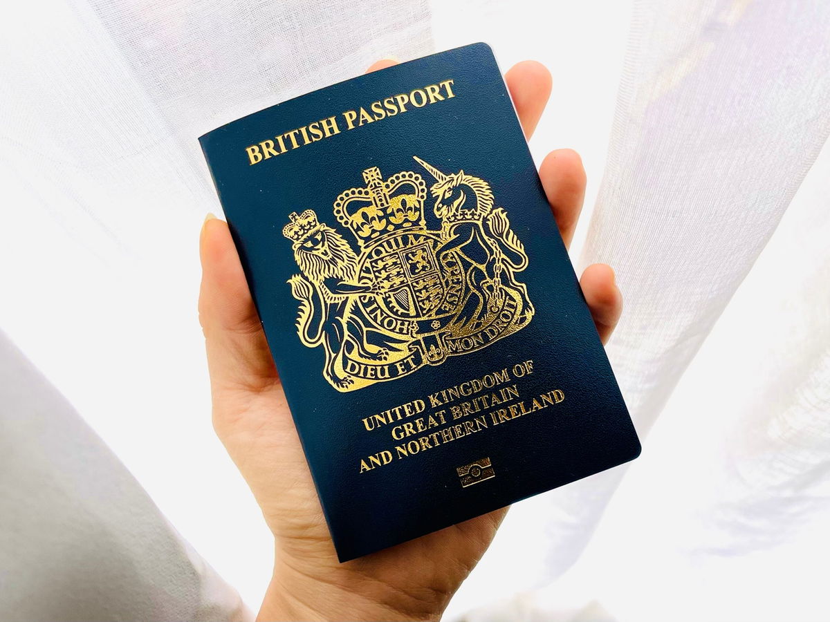 New British passport bearing King’s coat of arms begins to rollout this month