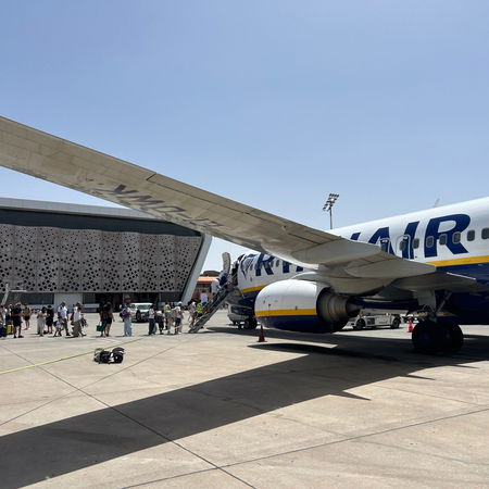 Pedestrians walking through a lively street in Bilbao city centre, northern Spain.