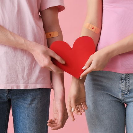 Pedestrians walking through a lively street in Bilbao city centre, northern Spain.
