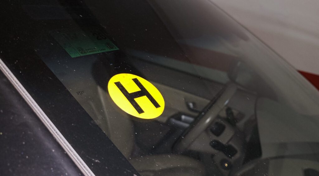 H sticker for "histórico".