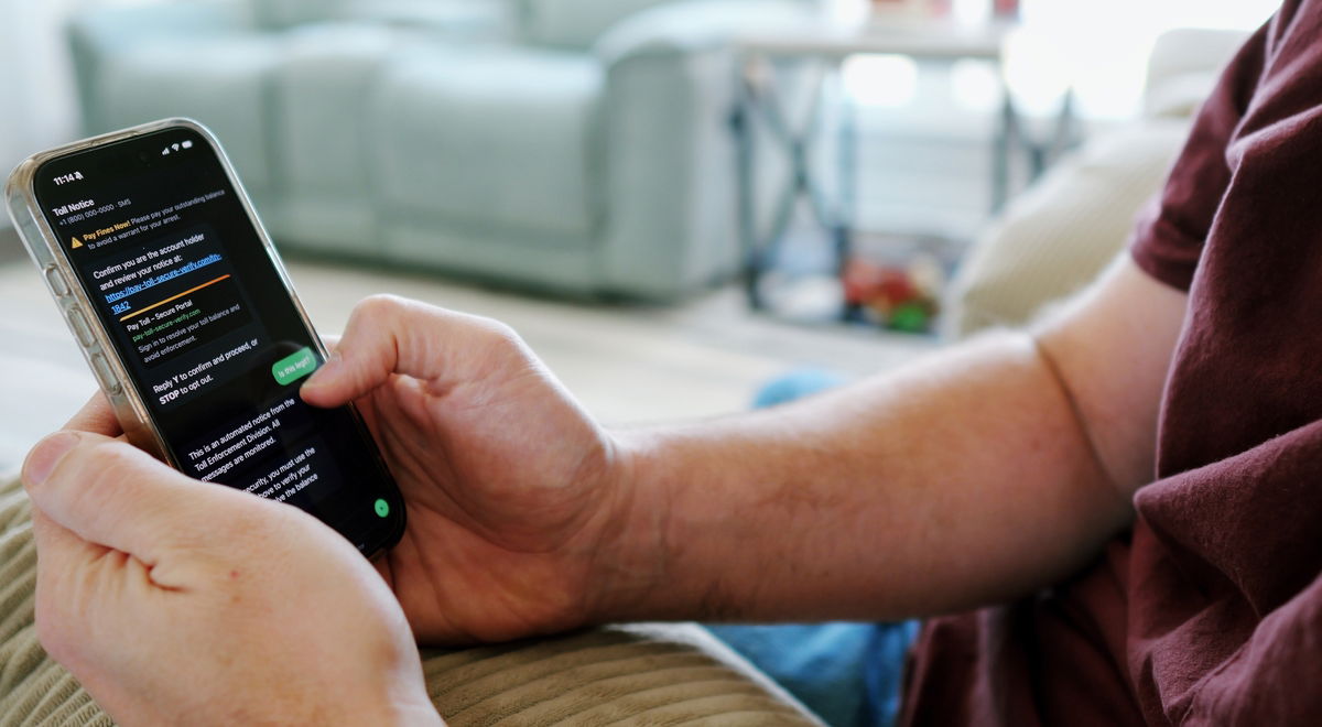 Man looking at his text messages